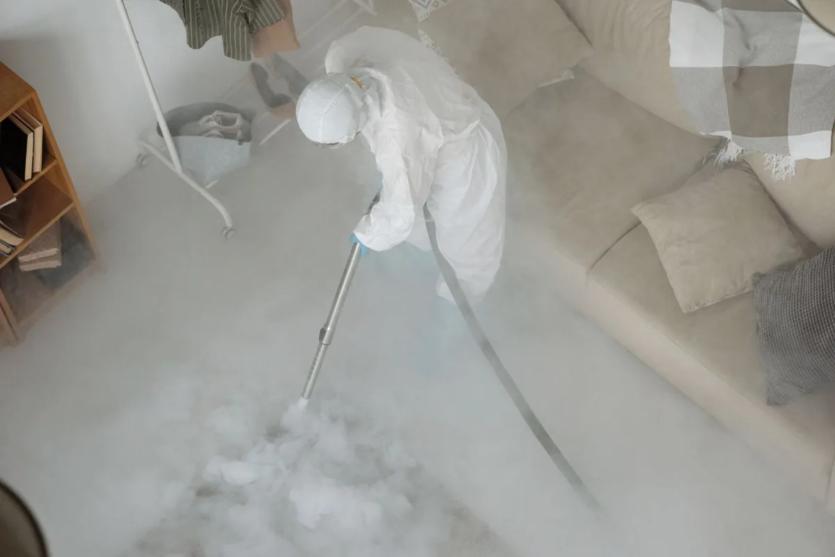 Biohazard cleanup technician in protective equipment, Midland Park, NJ